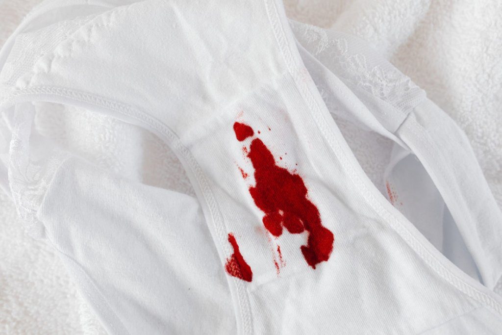 get period blood out of clothes