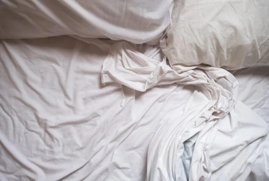 get sweat stains out of sheets